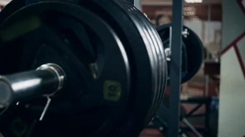 Massive barbell with weights on rack 動画素材 148296113