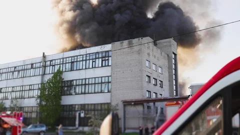 Massive blaze fire, building burning, firefighters team putting out the fire Vídeos de archivo 283132418