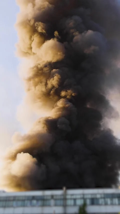 Massive blaze fire, building burning, firefighters team putting out the fire Video stock 283134067