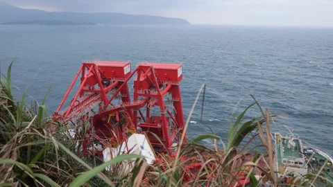 Massive Boat Transporting Cranes Sunk by Giant Mountain in the Sea 4K Destructio Stock Footage 295674587
