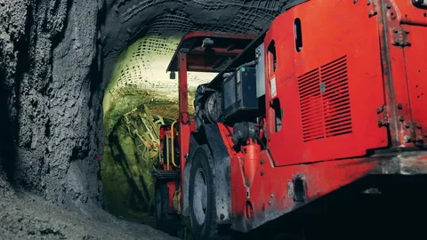 Massive boring machine working in the underground mine. Underground development Stock Footage 150819207