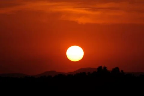 Massive bright red sunset Stock Photos