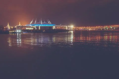 Massive building skyline light with reflection in the water. Night exposure l Foto stock