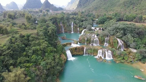 Massive Cascading Ban Gioc Waterfalls in North Vietnam Aerial Drone Pan Out Stock Footage 125537880
