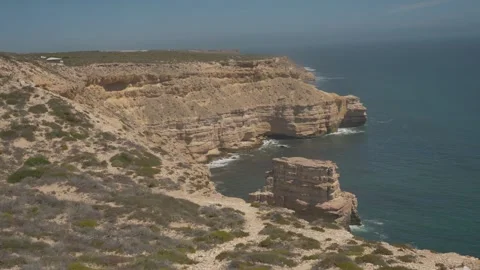Massive Cliffside Overlooking the Ocean Stock Footage 316004897