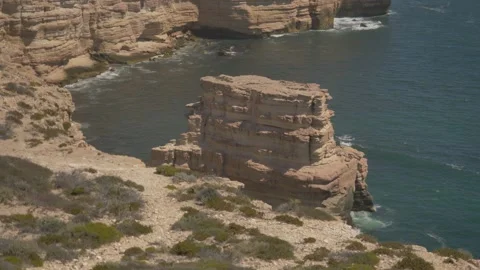 Massive Cliffside Rock in the Ocean Stock Footage 315984795