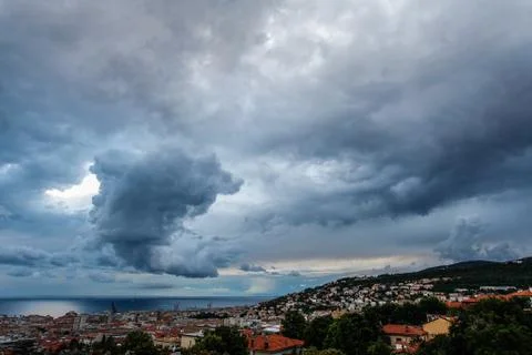 Massive cloud to ground lightning bolts hitting Stock Photos