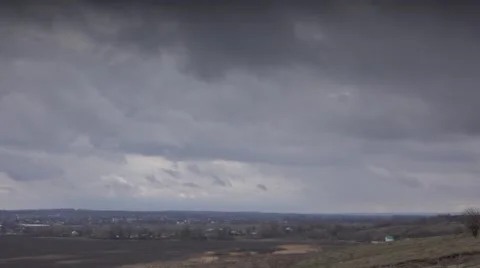 Massive Clouds Over a Willage. 4K UltraHD, UHD Stock Footage 49136732