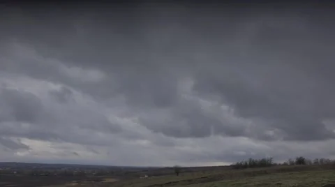 Massive Clouds Over a Willage. 4K UltraHD, UHD Stock Footage 49136801