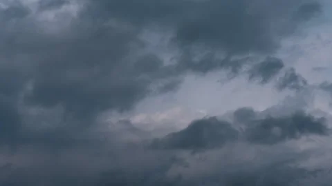 Massive clouds passing during Stock Footage 186967711