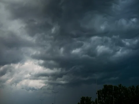 Massive clouds passing before thunder Stock Footage 78733753