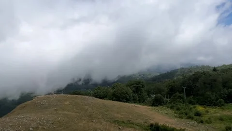 Massive Clouds Rolling Over Forested Mountain Ridge in Kartepe, Turkey Stock Footage 341818907