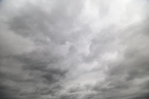 Massive cloudy sky with thunderous buildup, deep textured cumulonimbus form.. Stock Photos