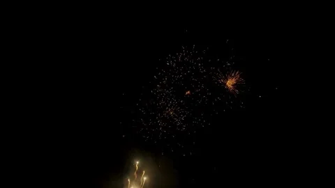 Massive colorful fireworks exploding in a smoky night sky Stock Footage 329673798