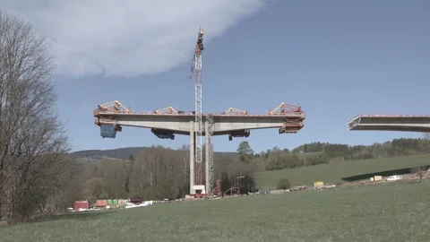 Massive concrete deck segment to complete a highway overpass Stock Footage 333398129