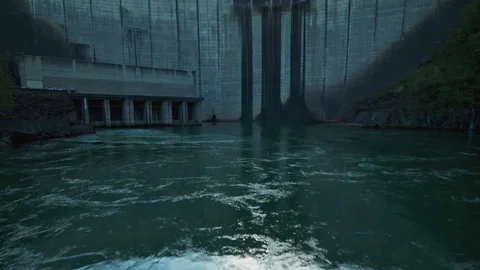 Massive concrete hydroelectric dam generating renewable energy Stock Footage 333148268
