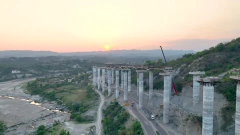 Massive concrete pillars of incomplete highway flyover in India.  Stock Footage 335643585