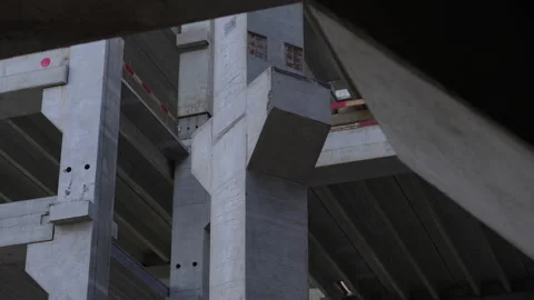 Massive concrete structures at modern building construction site Stock Footage 315959925