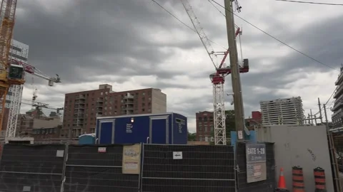 Massive Construction cranes building new condos in downtown Toronto 動画素材 155920357