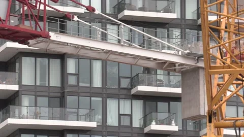 Massive Construction cranes building new condos in downtown Toronto Video stock 155921370