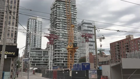 Massive Construction cranes building new condos in downtown Toronto Vidéo 155921990