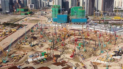 Massive construction site with crane and machine in Kowloon, Hong Kong, Daytime Stock-Footage 126026253