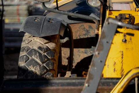 Massive construction wheel representing power Stock Photos