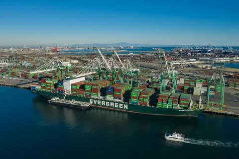 Massive container ship docked in Long Beach port in California USA Fotos de archivo
