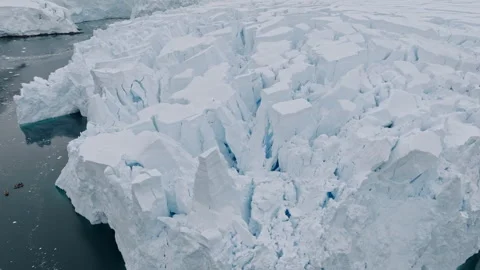 Massive Crevassed Antarctic Glacier by Ocean Drone View Vídeos de archivo 343376917