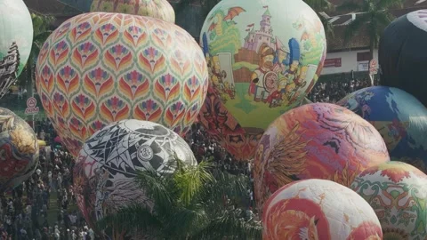 Massive Crowd and Giant Hot Air Balloons Filling Festival Ground Stock Footage 337980152