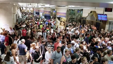 Massive crowd in Penn station NJTransit summer rush Stock Footage 77683707