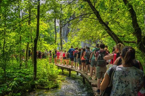 Massive crowds and queues to taking pictures at waterfalls in Plitvice Lakes Stock Photos