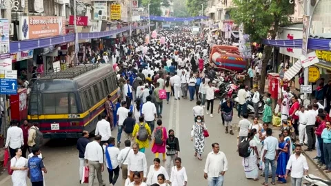 Massive crowds of people create a bustling scene at a popular Street market. Stock Footage 258656424