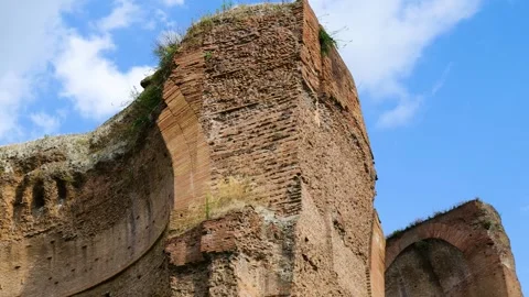 Massive crumbling brick ruins baths caracalla weathered archways vegetation set Stock Footage 324760113