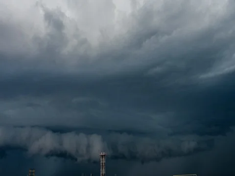 Massive dark clouds and lightning near airport before thunderstorm Stock Footage 78734705