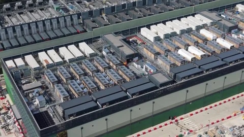 Massive Data Center Campus Infrastructure From Above on a Clear Day Stock Footage 339645348