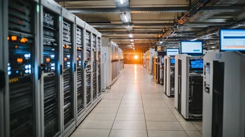 Massive data center filled with rows of servers with glowing lights Video stock 315157539