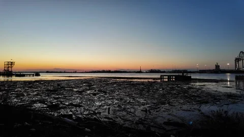 Massive Debris Field on the Delaware River Near Philadelphia at Sunset Stock Footage 271611301