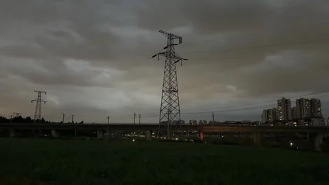 Massive Electricity Pylon and HighSpeed Railway Track at Night in Chinese Ci Видео 334696560