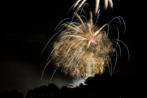 Massive explosion of fireworks rockets. Stock Photos