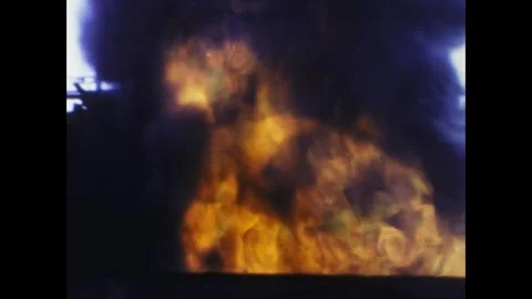 Massive explosion producing intense flames and thick dark smoke Stock Footage 326896296