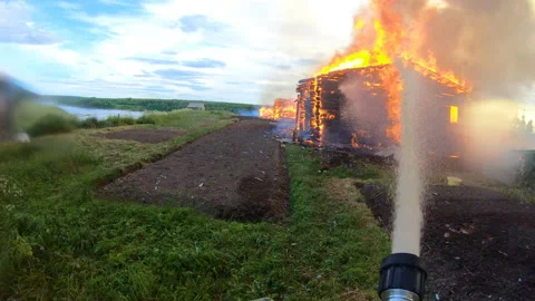 Massive fire in the village.Work of firefighters. Stock Footage 139412359