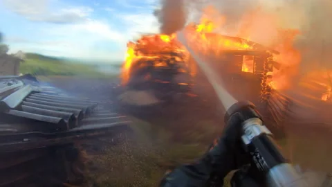 Massive fire in the village.Work of firefighters. Stock Footage 139412438