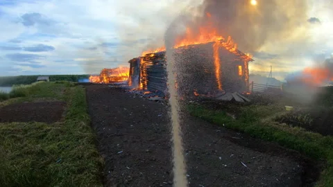 Massive fire in the village.Work of firefighters. Stock Footage 139412545