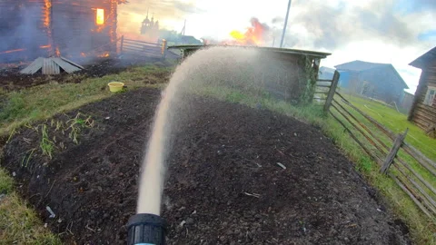 Massive fire in the village.Work of firefighters. Stock Footage 139412649