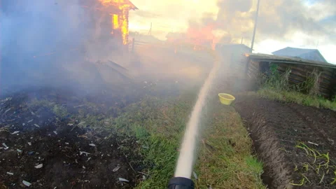 Massive fire in the village.Work of firefighters. Stock Footage 139412744