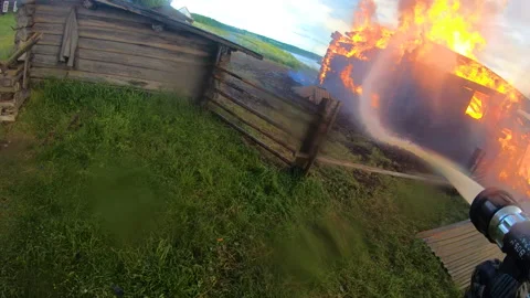 Massive fire in the village.Work of firefighters. Stock Footage 139413007