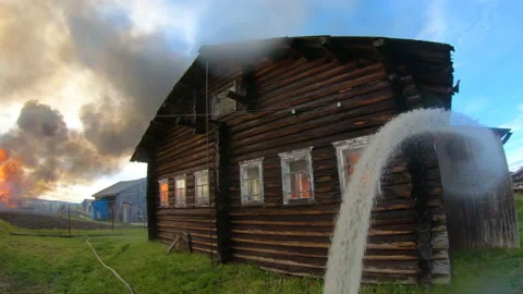 Massive fire in the village.Work of firefighters. Stock Footage 157558005