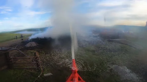 Massive fire in the village.Work of firefighters. Stock Footage 157558176