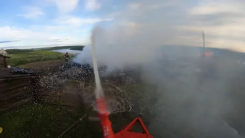 Massive fire in the village.Work of firefighters. Stock Footage 157558243